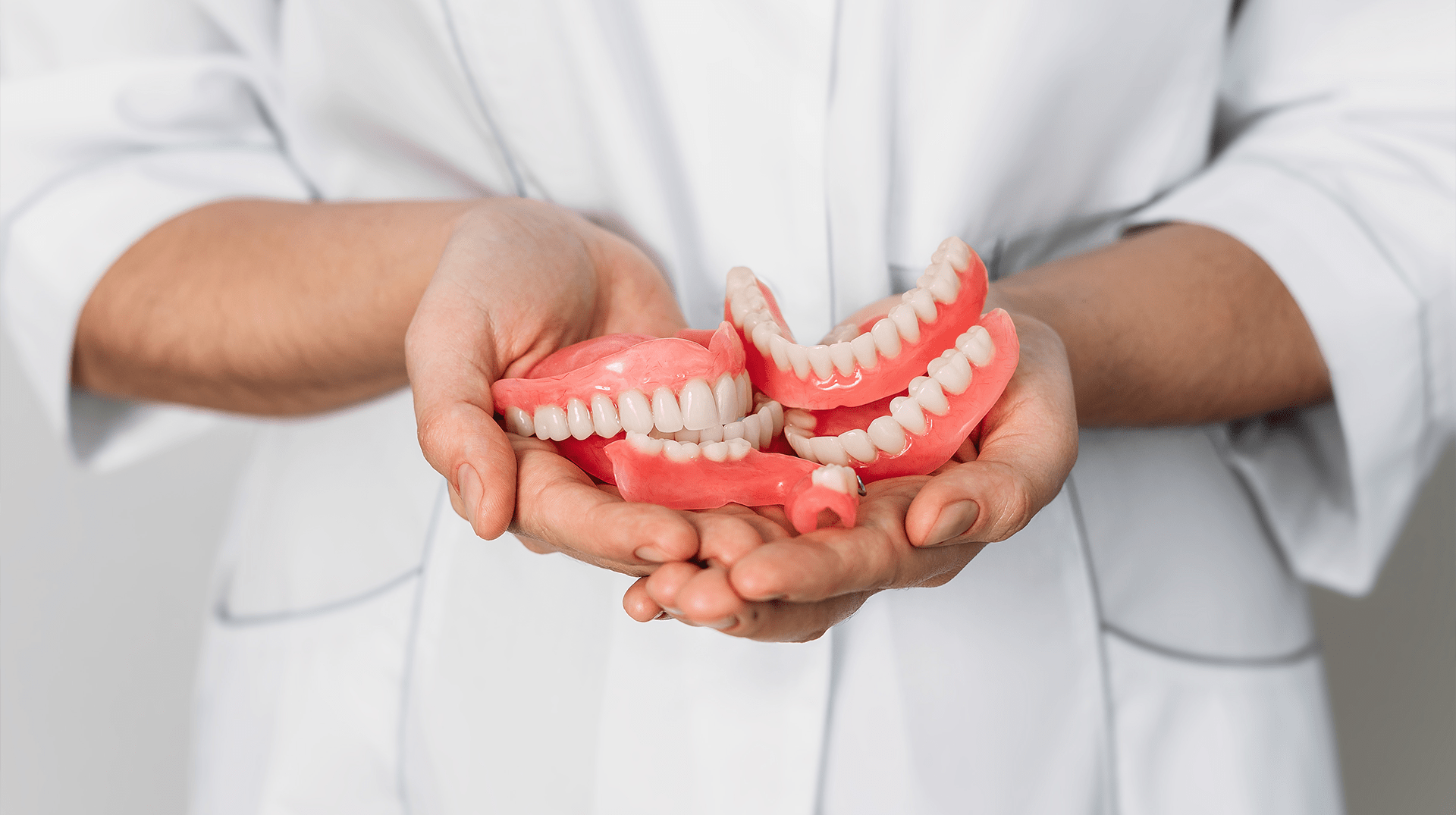 What occurs during a consultation for dentures?